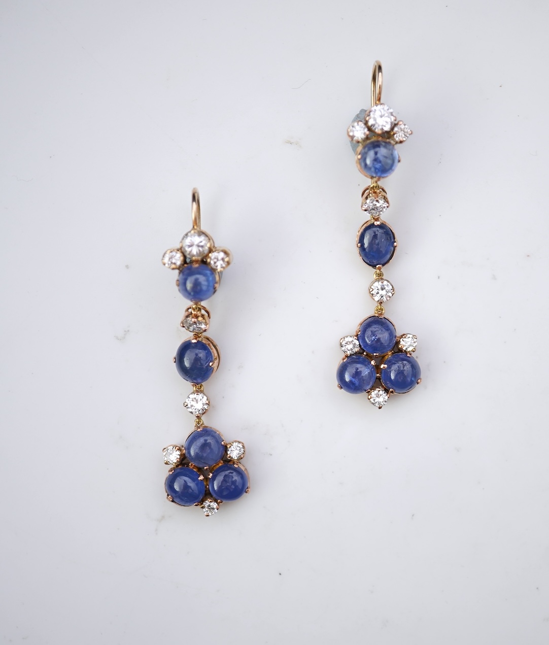 A pair of sapphire and diamond drop earrings
